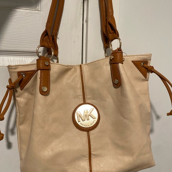 Michael Kors Handbags - Michael Kors Cream Leather Shoulder Bag with Tan Trim